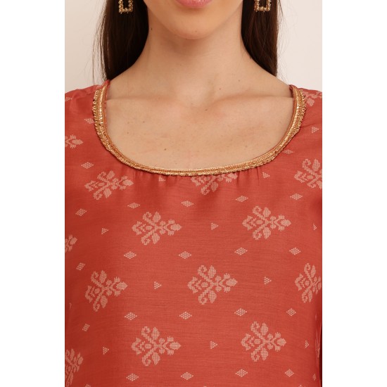 Riie  rust color silk kurta with golden zari lace detailed work